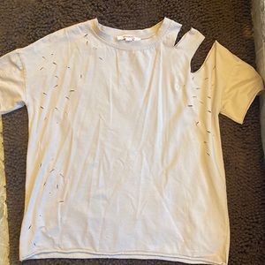 Cute distressed top, cut out sexy shoulder. Worn once💕
